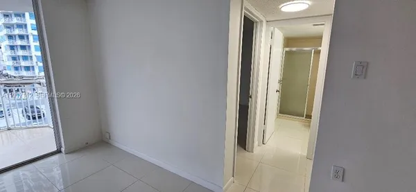 a view of balcony with a potted plant