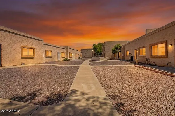 a house with yard in front of it