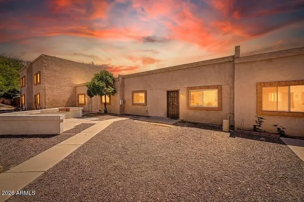 a view of a house with a patio