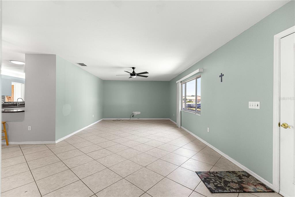 8475 Southeast 137th Loop Summerfield, FL 34491 - Photo 4 of 75 a view of an empty room and a window