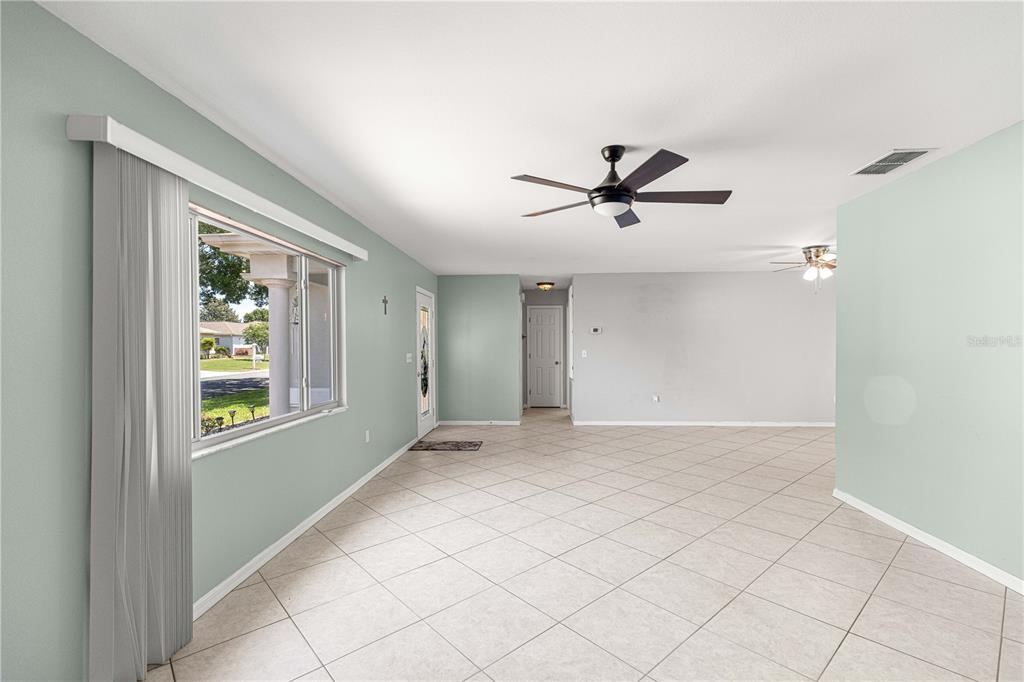 8475 Southeast 137th Loop Summerfield, FL 34491 - Photo 5 of 75 a view of an empty room with a window