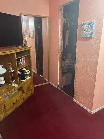 an empty room with windows