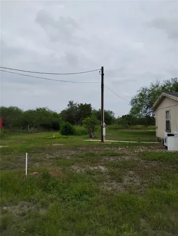 a view of a golf course with a lake