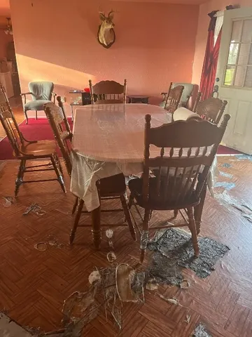 a view of walk in closet with clothes