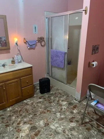 a living room with table and chairs