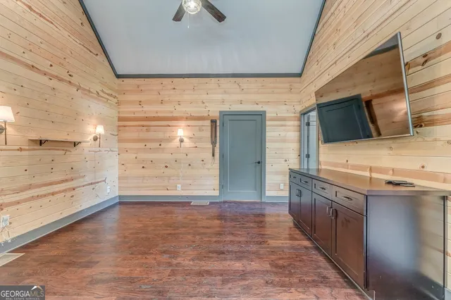 a bathroom with a bathtub and window