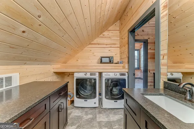 a view of an empty room and cabinet