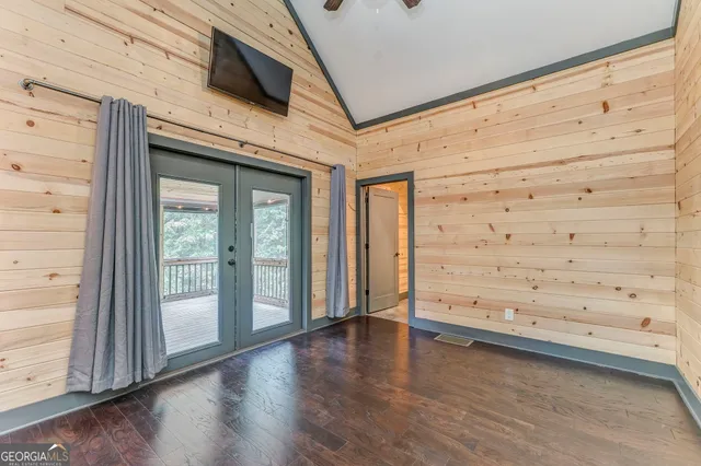 wooden floor and window in an empty room