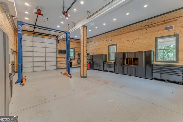a view of an empty room with glass door