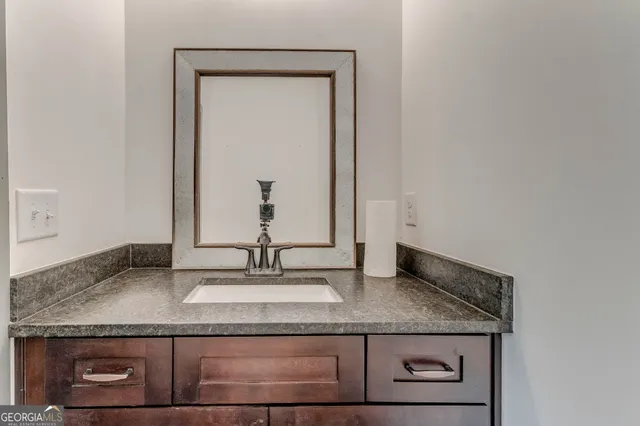 a view of a house with yard and a garden