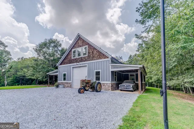 a big yard with large trees