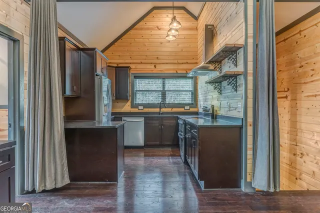 a view of a living room and floor to ceiling window