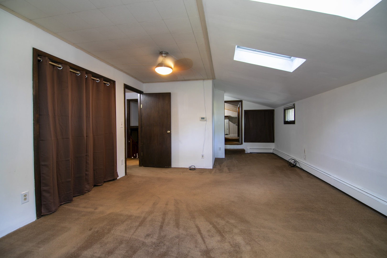 201 East Vanderkarr Road St. Anne, IL 60964 - Photo 14 of 32 a view of an empty room with a window