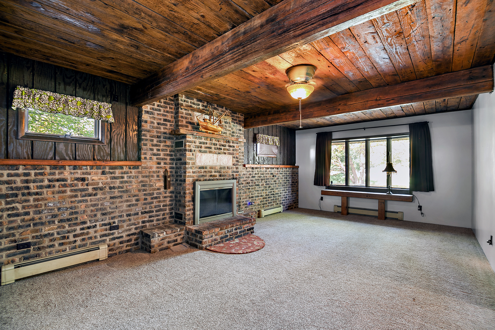 201 East Vanderkarr Road St. Anne, IL 60964 - Photo 2 of 32 a view of an empty room with a fireplace