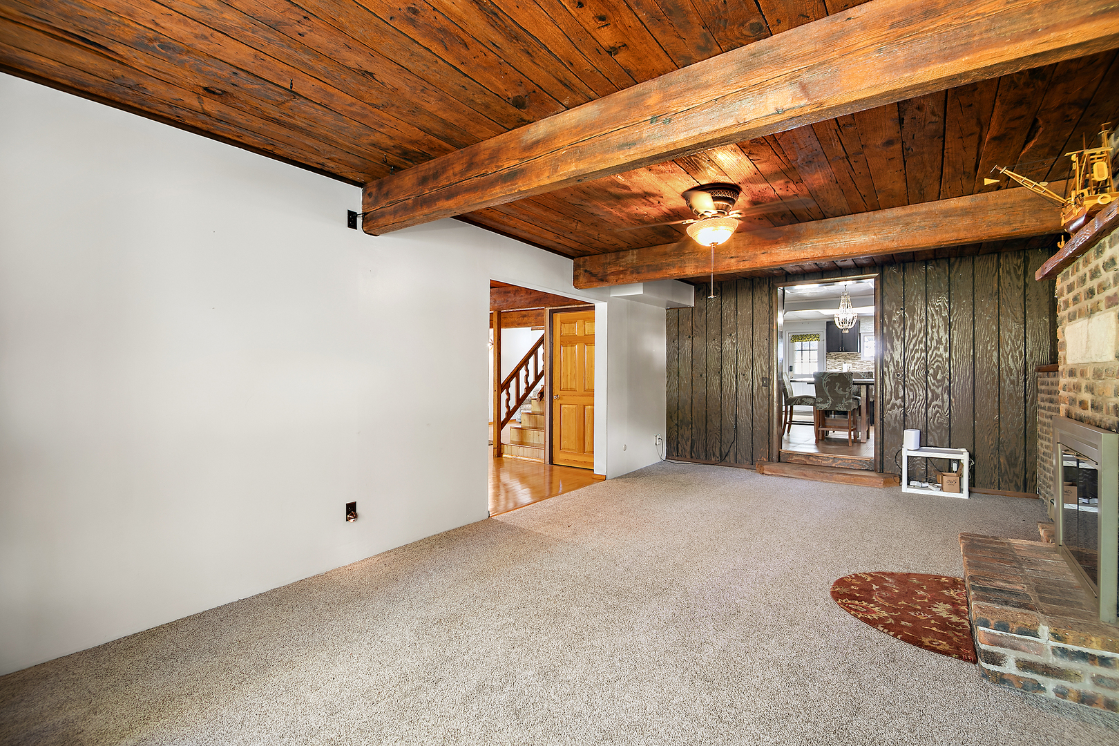 201 East Vanderkarr Road St. Anne, IL 60964 - Photo 3 of 32 a view of a room with wooden floor