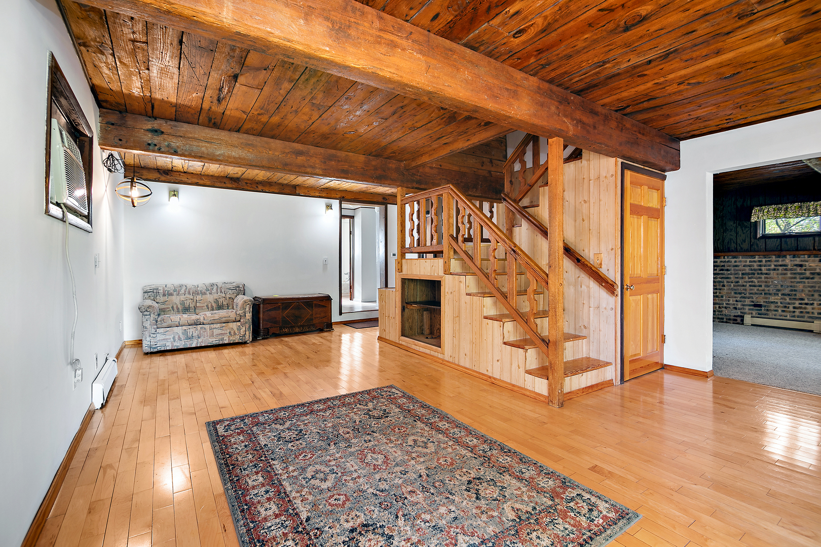 201 East Vanderkarr Road St. Anne, IL 60964 - Photo 4 of 32 a view of an empty room with wooden floor