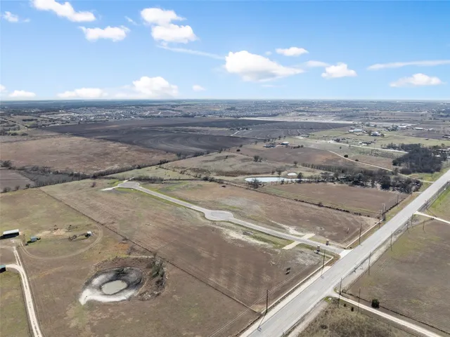 an aerial view of beach and ocean