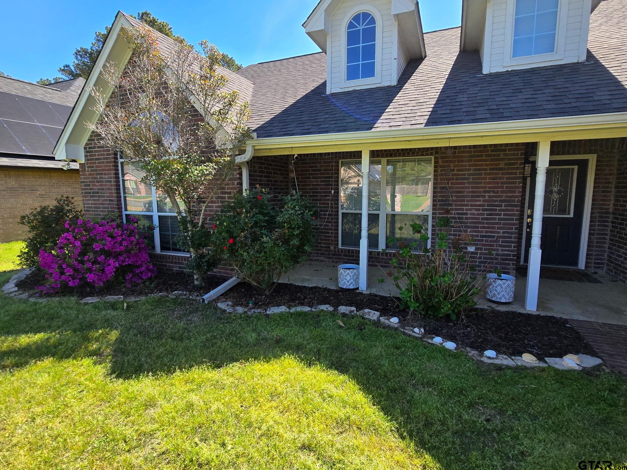 21237 Altuda Lane Flint, TX 75762 - Photo 41 of 48 a front view of a house with garden