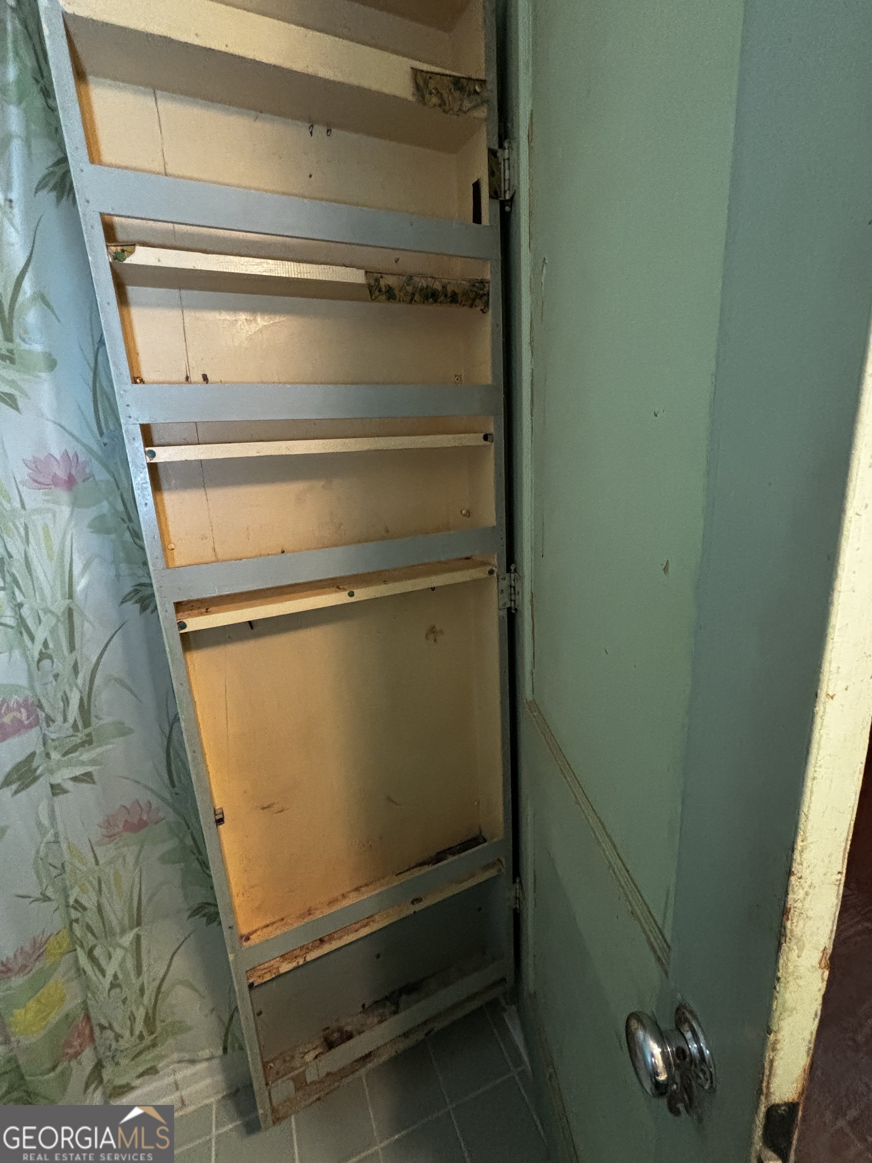 189 Whiteoak Campground Road Thomson, GA 30824 - Photo 24 of 32 a view of an empty room with wooden floor