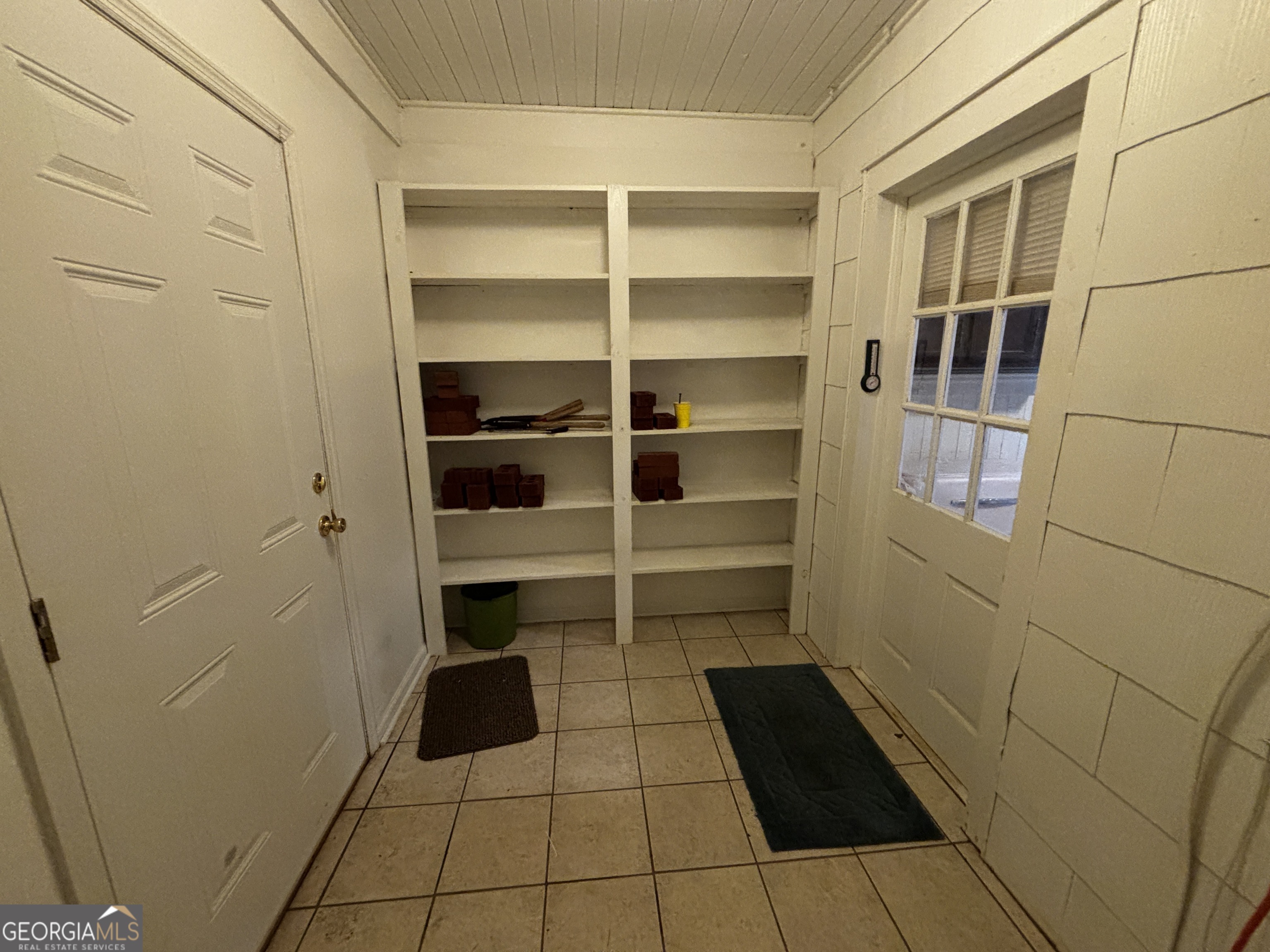 189 Whiteoak Campground Road Thomson, GA 30824 - Photo 26 of 32 a room with walk in closet and window