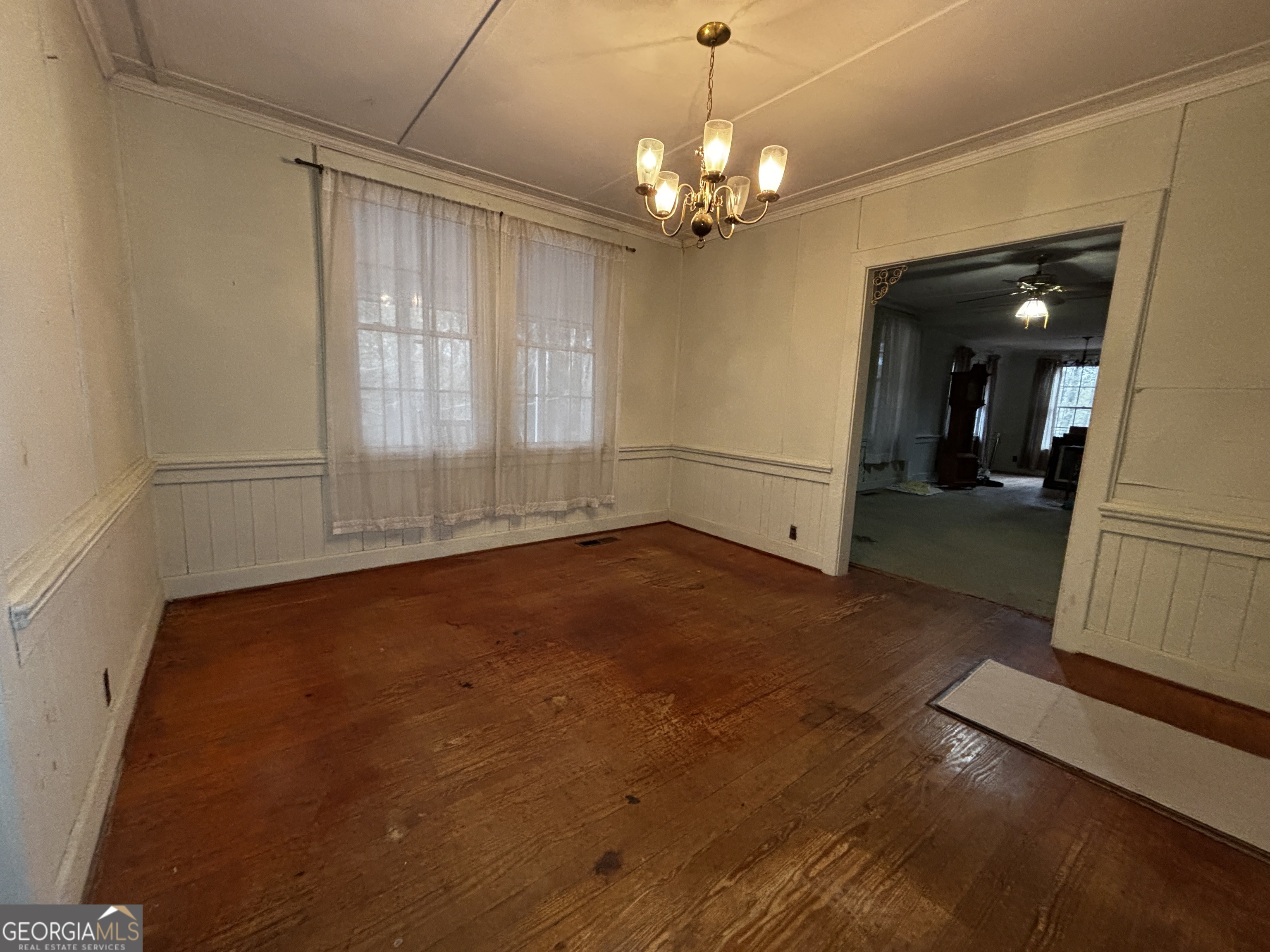 189 Whiteoak Campground Road Thomson, GA 30824 - Photo 10 of 32 wooden floor in an empty room with a window