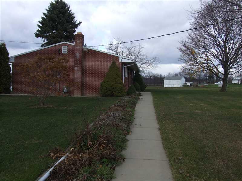 353 Riemer Road Sarver, PA 16055 - Photo 8 of 23 Exterior Back. CEMENT WALK TO REAR DOOR