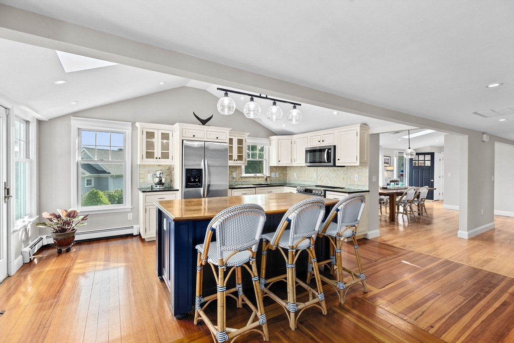 35 Ely Avenue Scituate, MA 02066 - Photo 12 of 33 a view of a dining room with furniture window and wooden floor