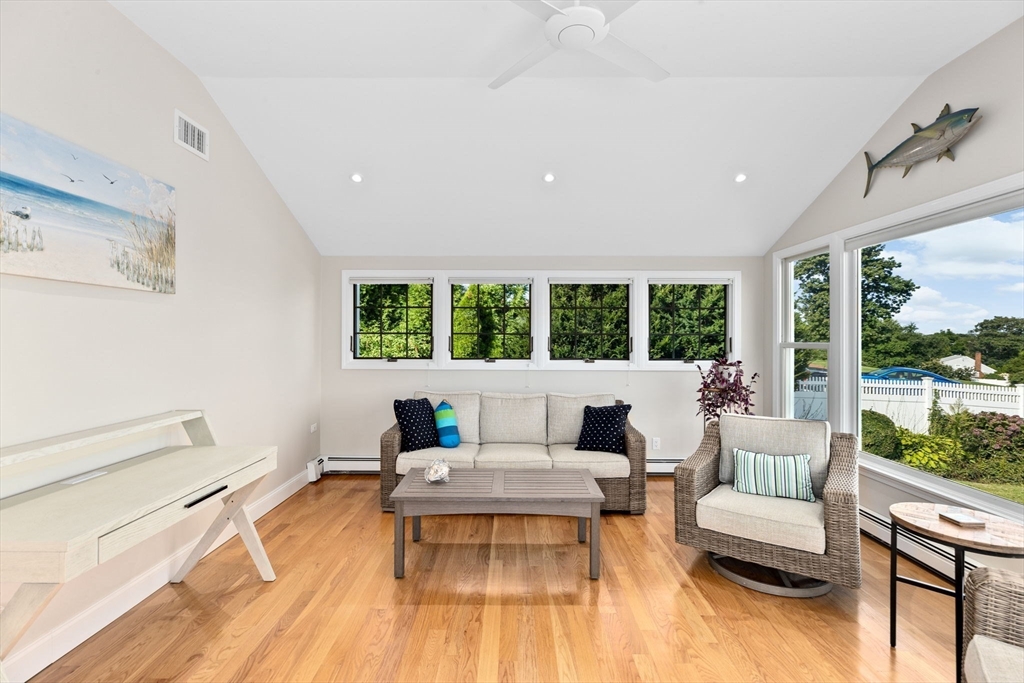 35 Ely Avenue Scituate, MA 02066 - Photo 18 of 33 a living room with furniture and a large window