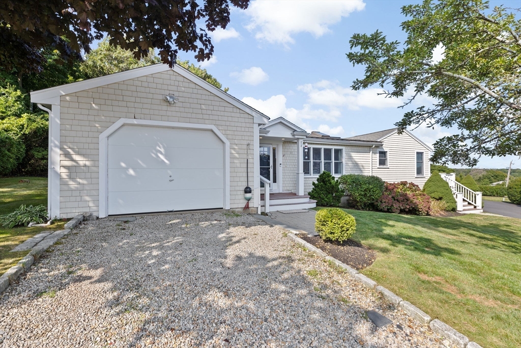 35 Ely Avenue Scituate, MA 02066 - Photo 29 of 33 a front view of a house with a yard
