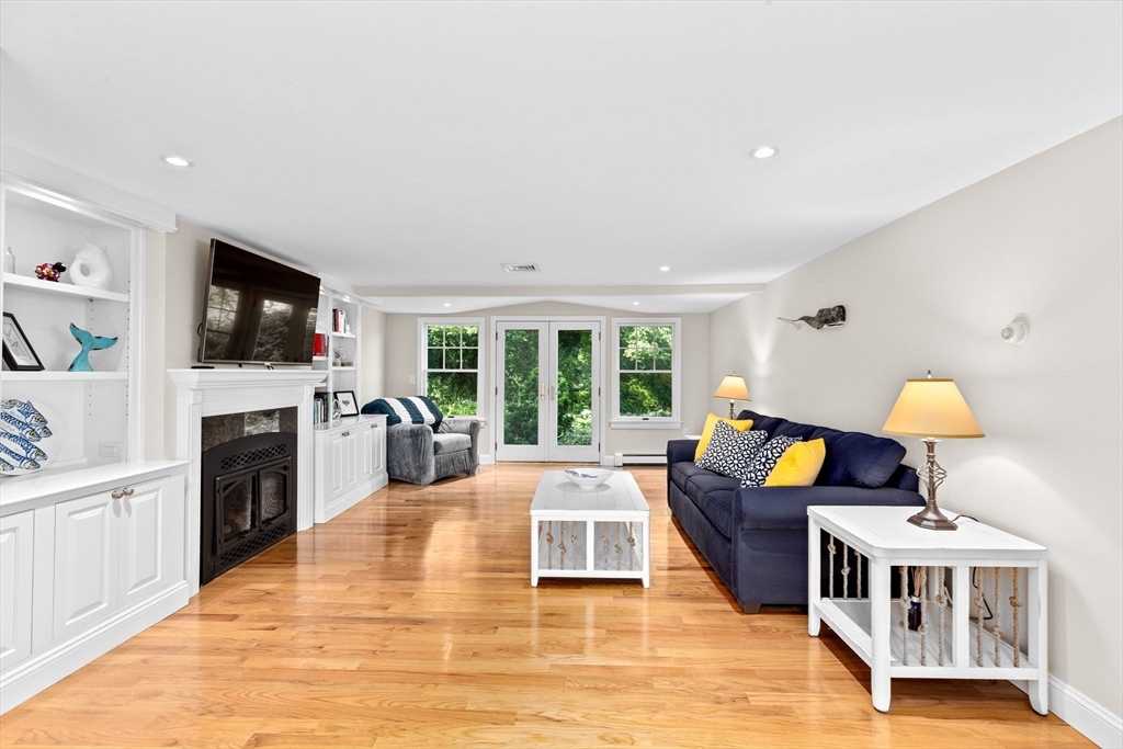 35 Ely Avenue Scituate, MA 02066 - Photo 7 of 33 a living room with furniture and a flat screen tv