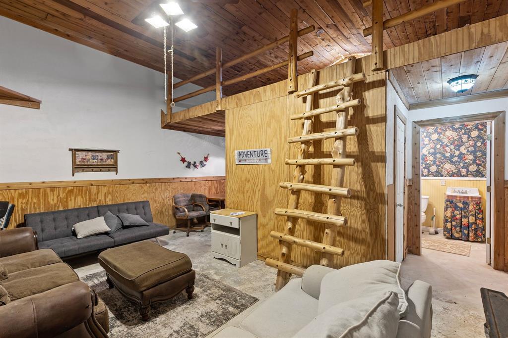 690 County Road Paris, TX 75462 - Photo 29 of 40 a living room with furniture and a window