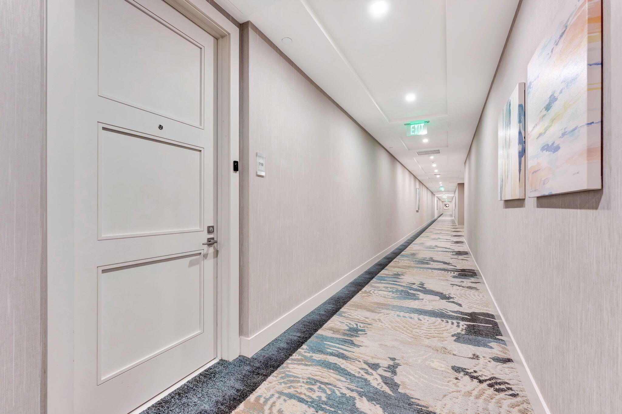 155 East Boca Raton Road, Unit 719 Boca Raton, FL 33432 - Photo 11 of 102 a view of a hallway with wooden floor and staircase