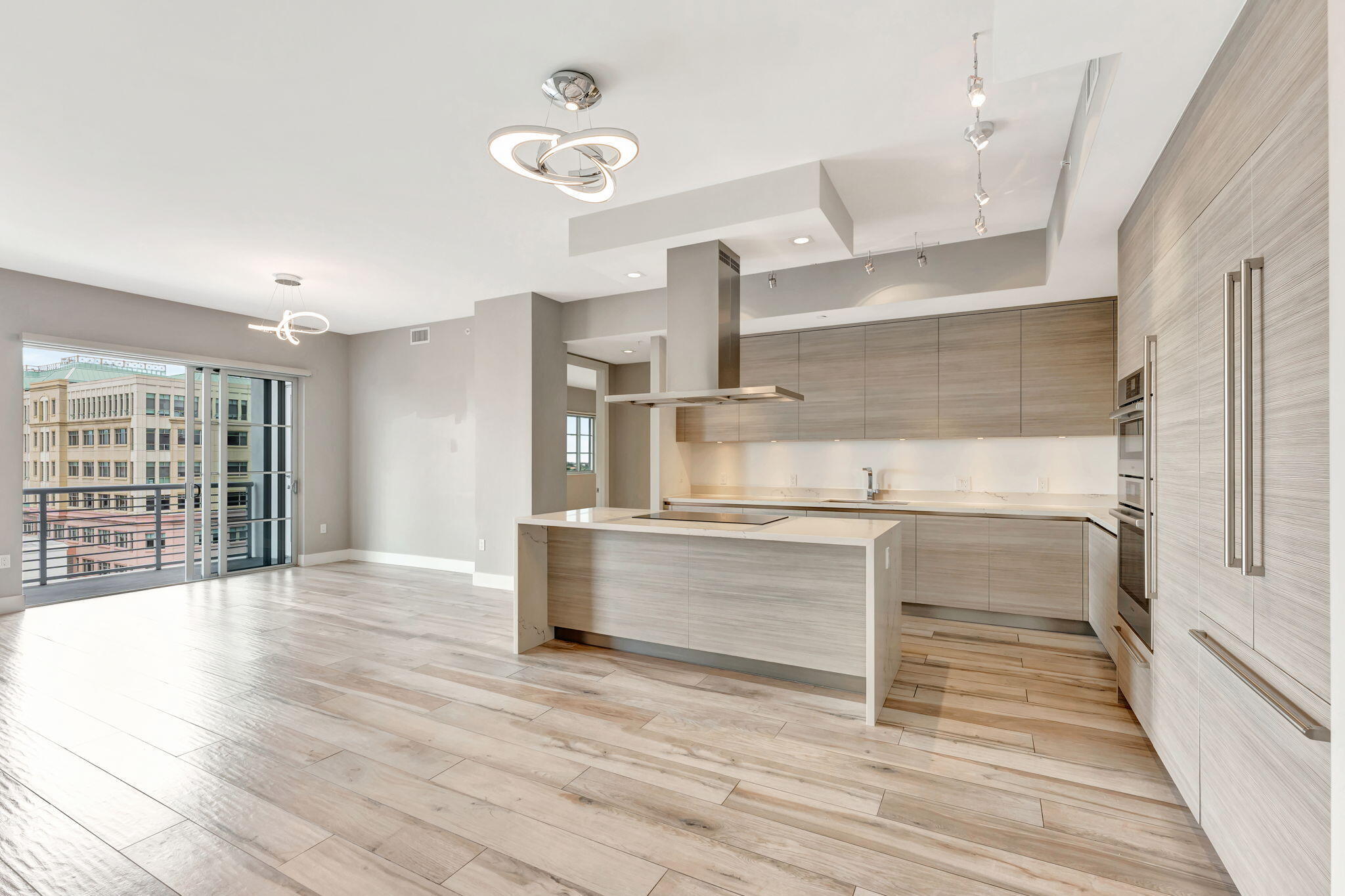 155 East Boca Raton Road, Unit 719 Boca Raton, FL 33432 - Photo 17 of 102 a view of a kitchen with wooden floor and electronic appliances