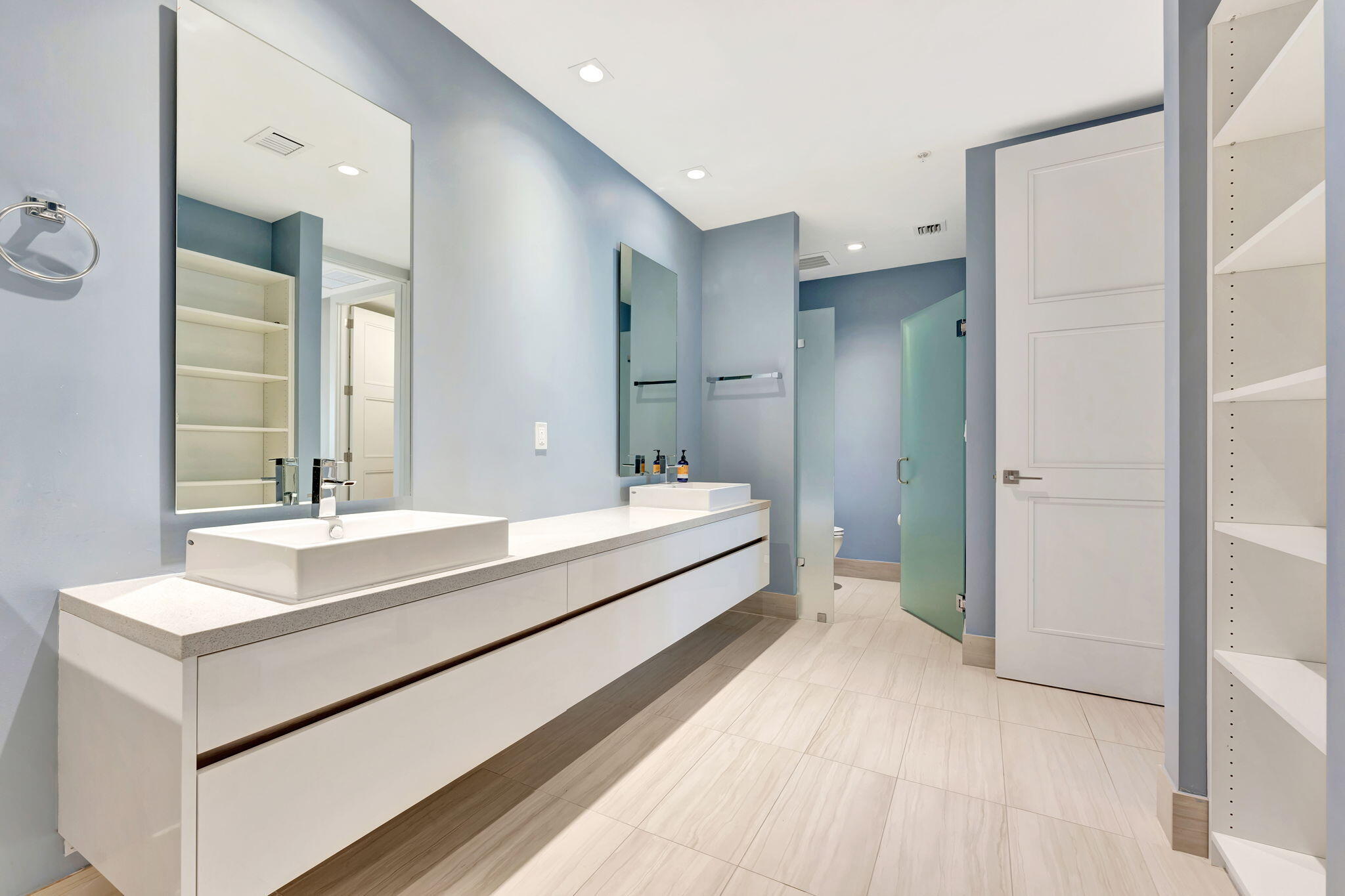 155 East Boca Raton Road, Unit 719 Boca Raton, FL 33432 - Photo 37 of 102 a spacious bathroom with a double vanity sink mirror and double