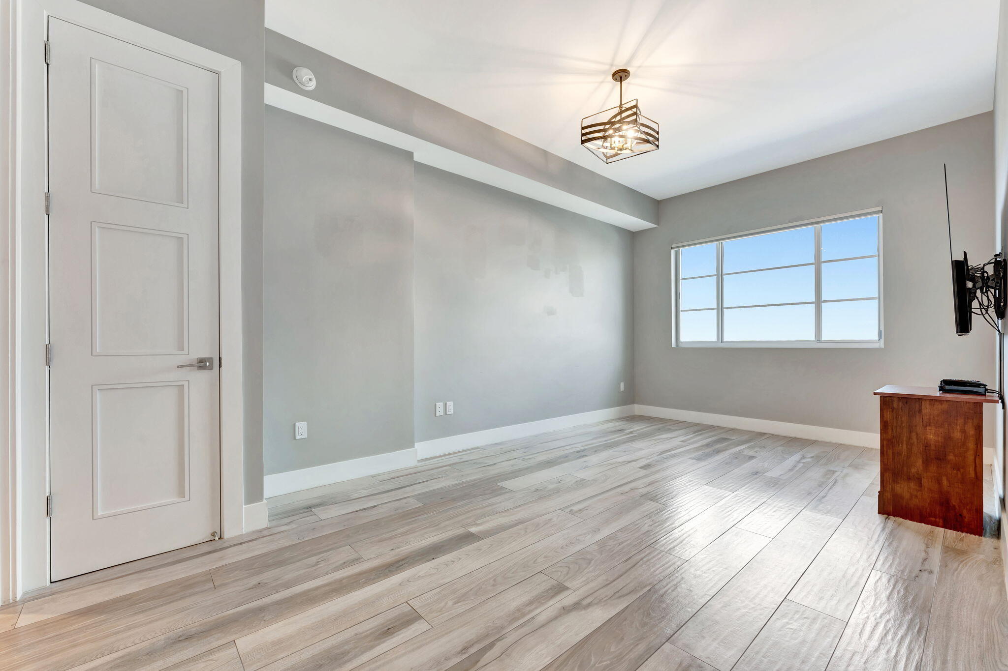 155 East Boca Raton Road, Unit 719 Boca Raton, FL 33432 - Photo 39 of 102 wooden floor in an empty room with a window