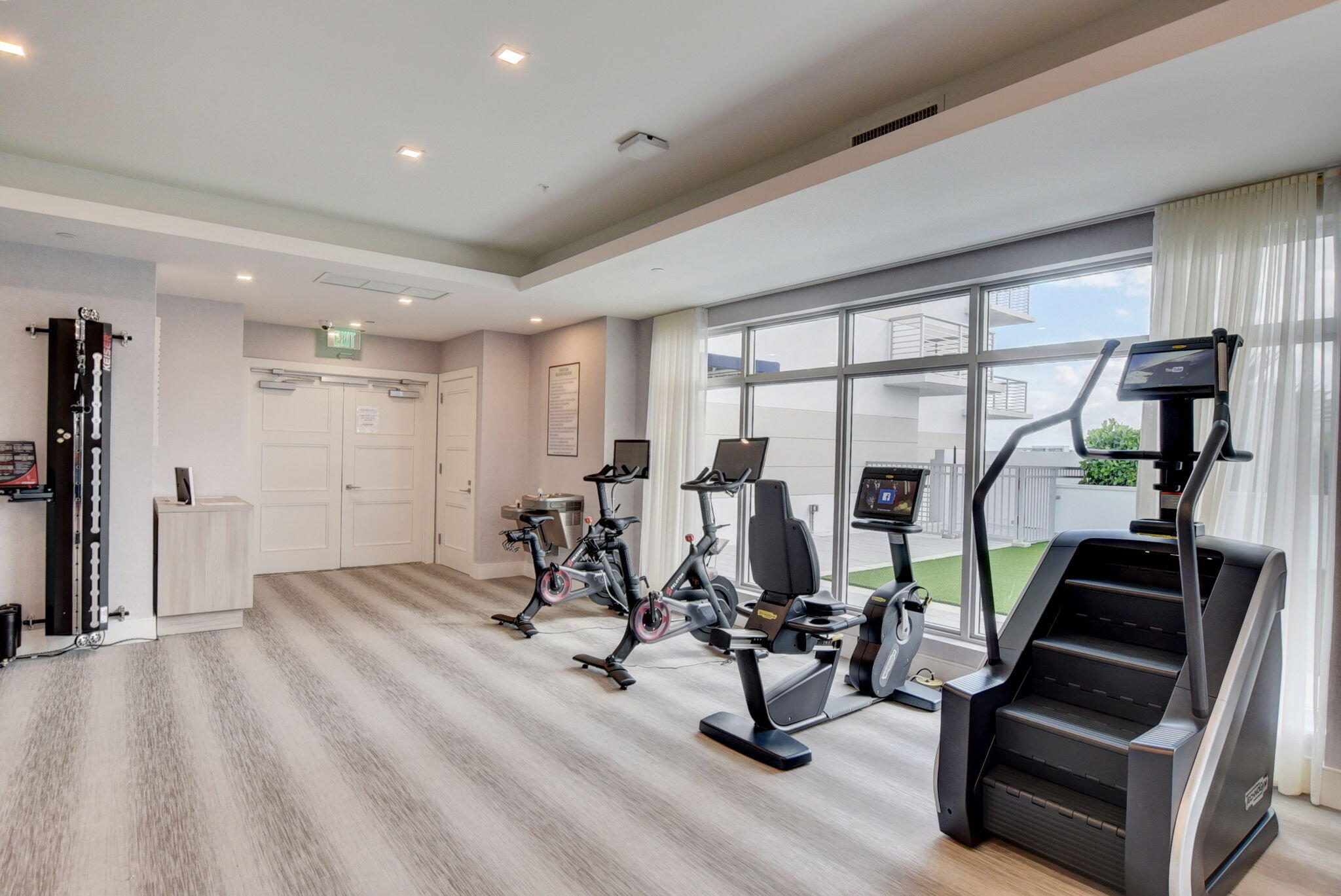 155 East Boca Raton Road, Unit 719 Boca Raton, FL 33432 - Photo 92 of 102 a view of a room with gym equipment