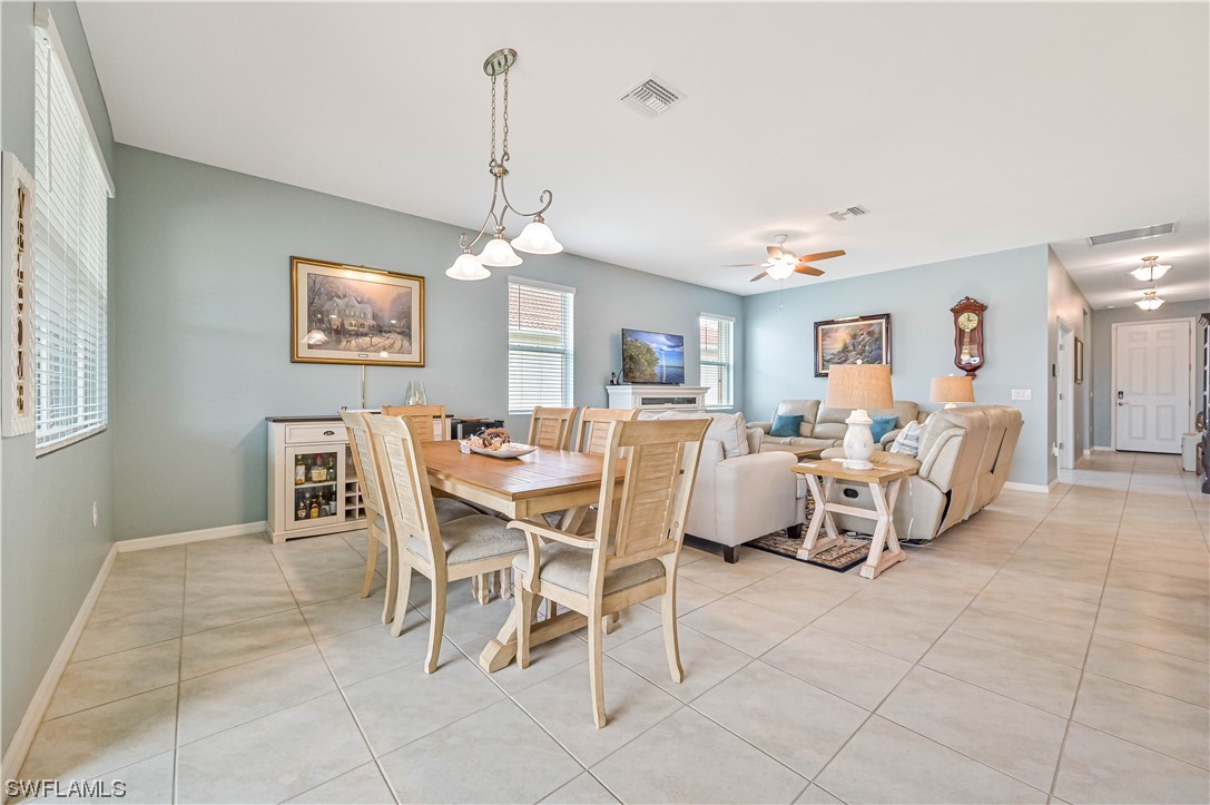 3435 Gold Flower Street Fort Myers, FL 33905 - Photo 14 of 39 a dining room with furniture and window