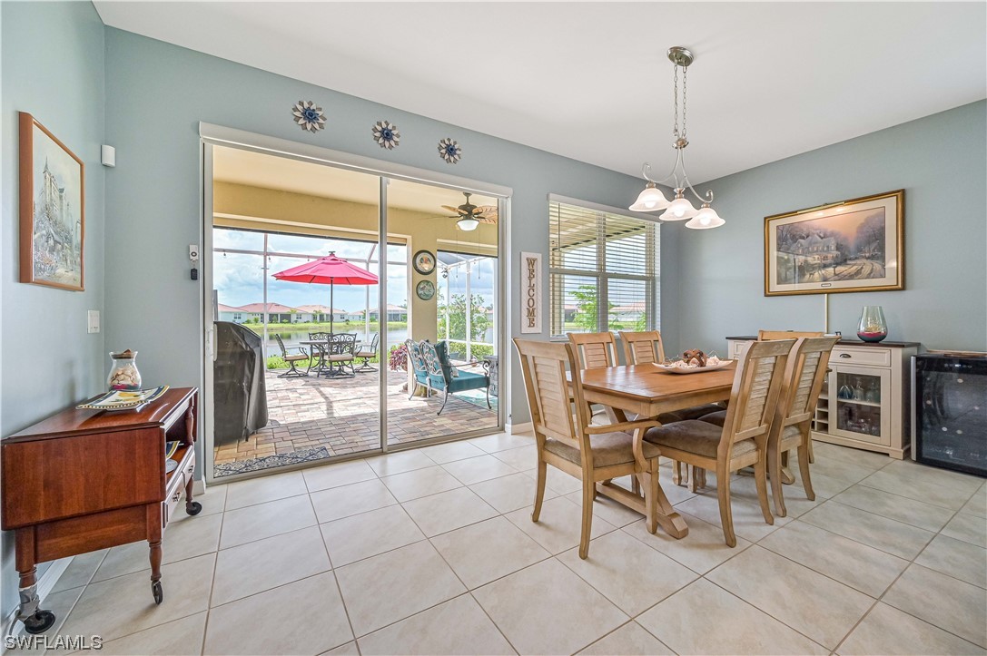 3435 Gold Flower Street Fort Myers, FL 33905 - Photo 17 of 39 a dining room with furniture and window
