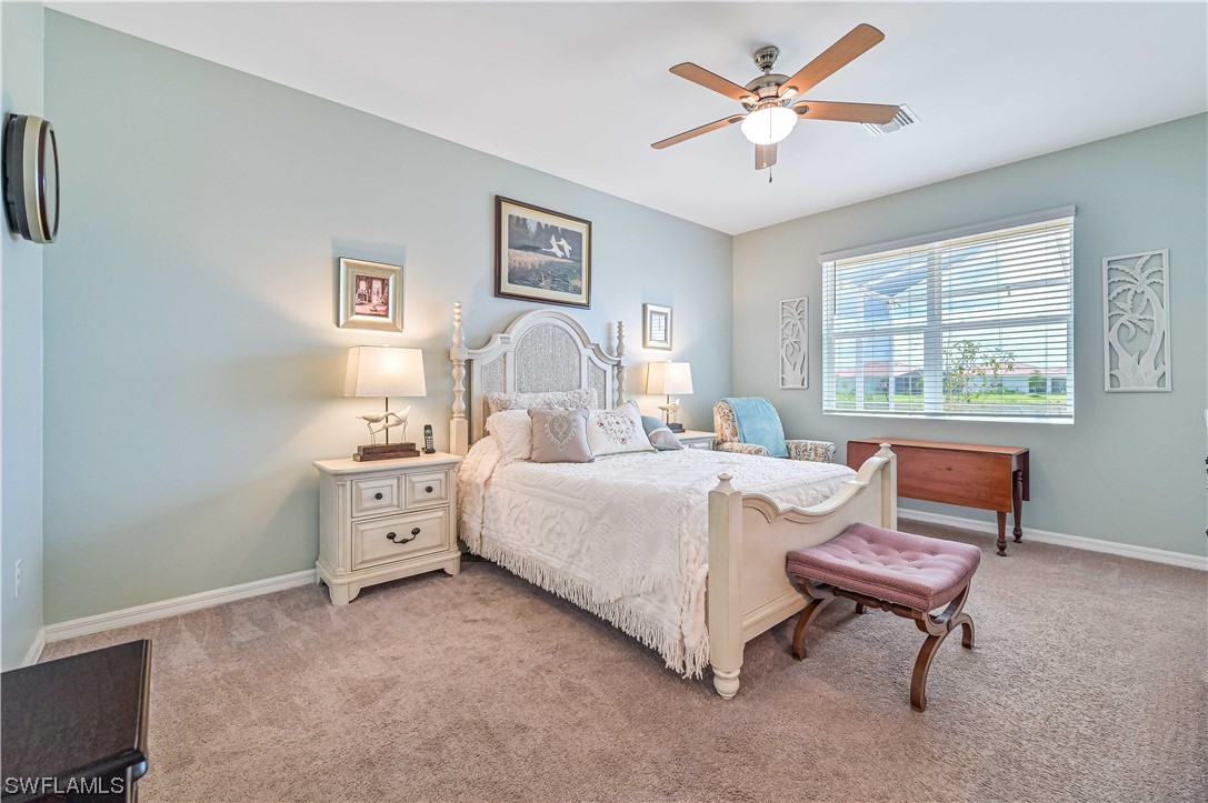 3435 Gold Flower Street Fort Myers, FL 33905 - Photo 25 of 39 a bed room with a bed and a window