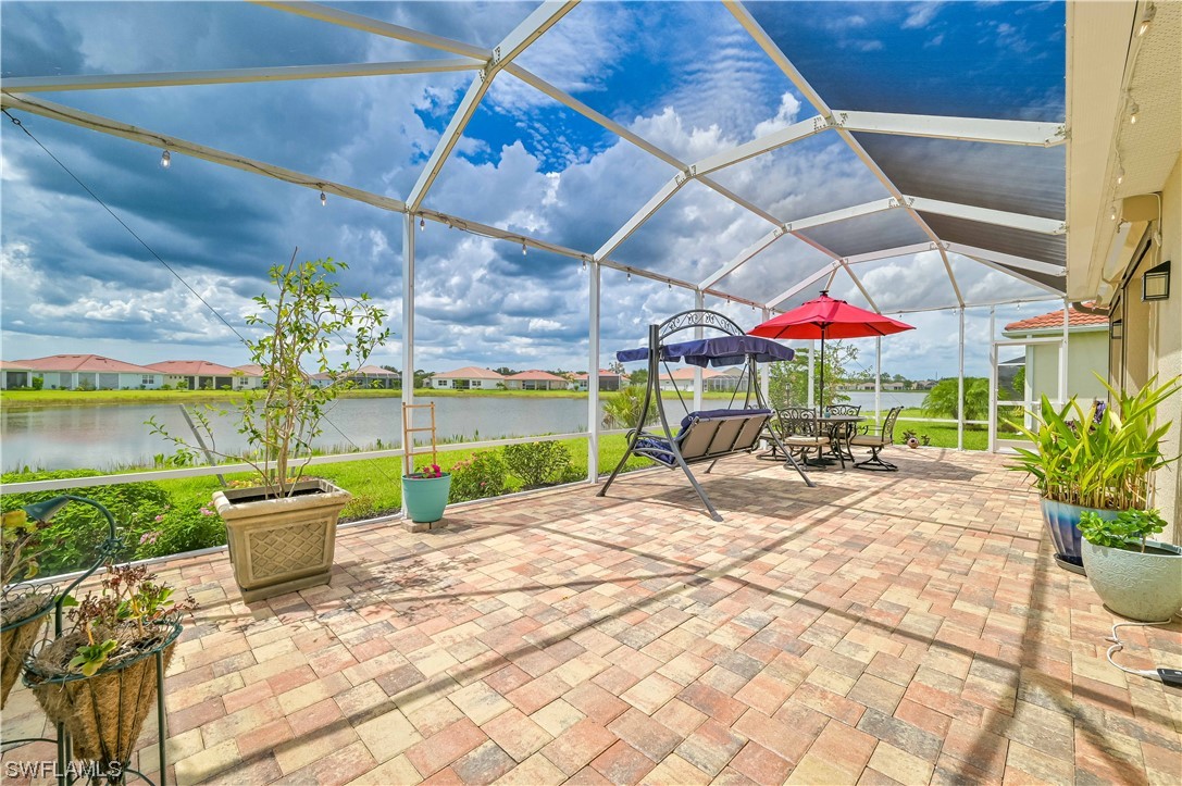 3435 Gold Flower Street Fort Myers, FL 33905 - Photo 6 of 39 a view of a chairs and tables in patio