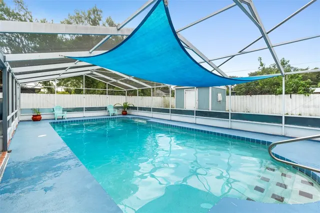 a view of a backyard of a house