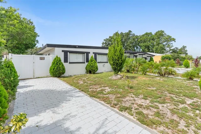 a house view with a garden space