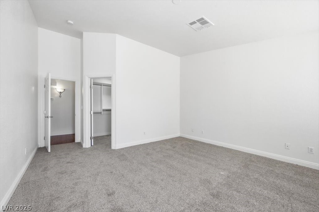 573 Beryl Court Henderson, NV 89015 - Photo 30 of 52 Spacious walk-in closet in the primary bedroom.