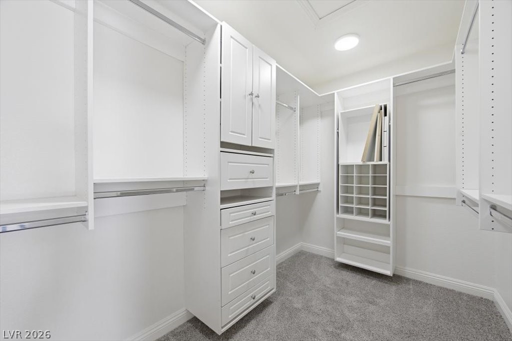573 Beryl Court Henderson, NV 89015 - Photo 36 of 52 Customized walk-in closet with built-in storage and custom shelving.