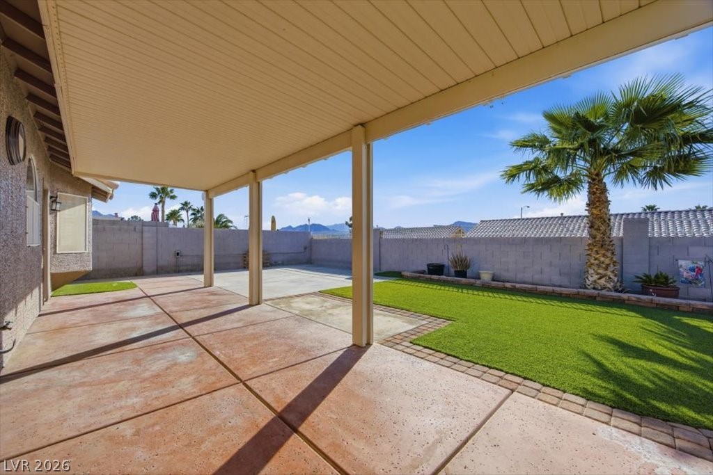 573 Beryl Court Henderson, NV 89015 - Photo 41 of 52 Look at the size of this yard! Low maintenance landscape and synthetic grass make it easy to enjoy!