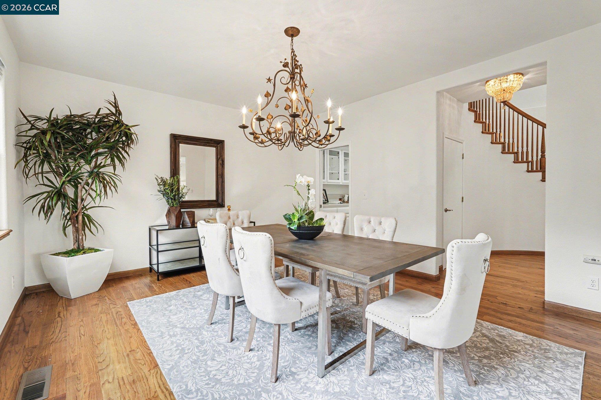 4885 Milden Road Martinez, CA 94553 - Photo 12 of 52 a view of a dining room with furniture and a chandelier