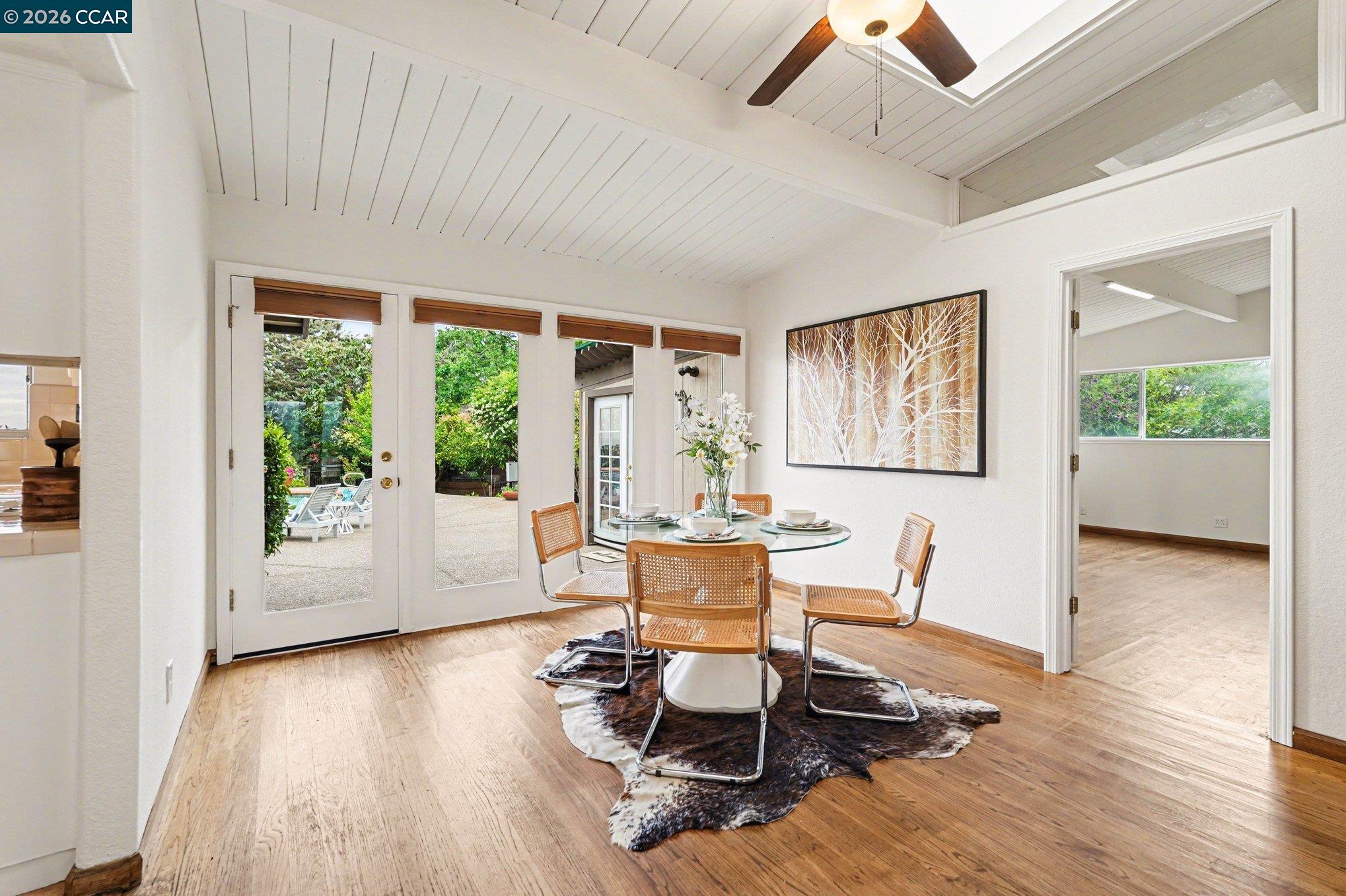 4885 Milden Road Martinez, CA 94553 - Photo 16 of 52 a living room with fireplace furniture and a wooden floor