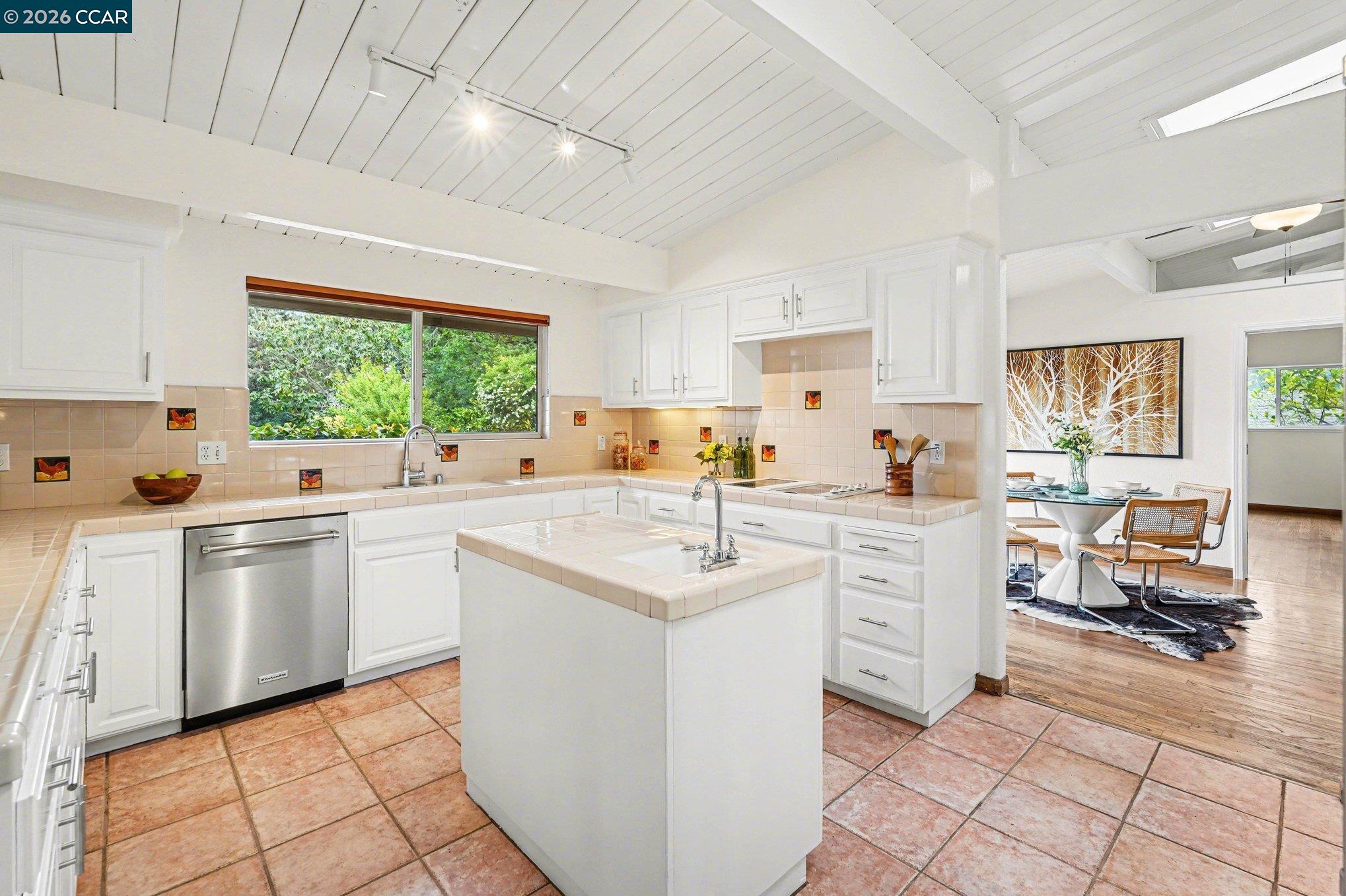 4885 Milden Road Martinez, CA 94553 - Photo 17 of 52 a kitchen with sink cabinets and window