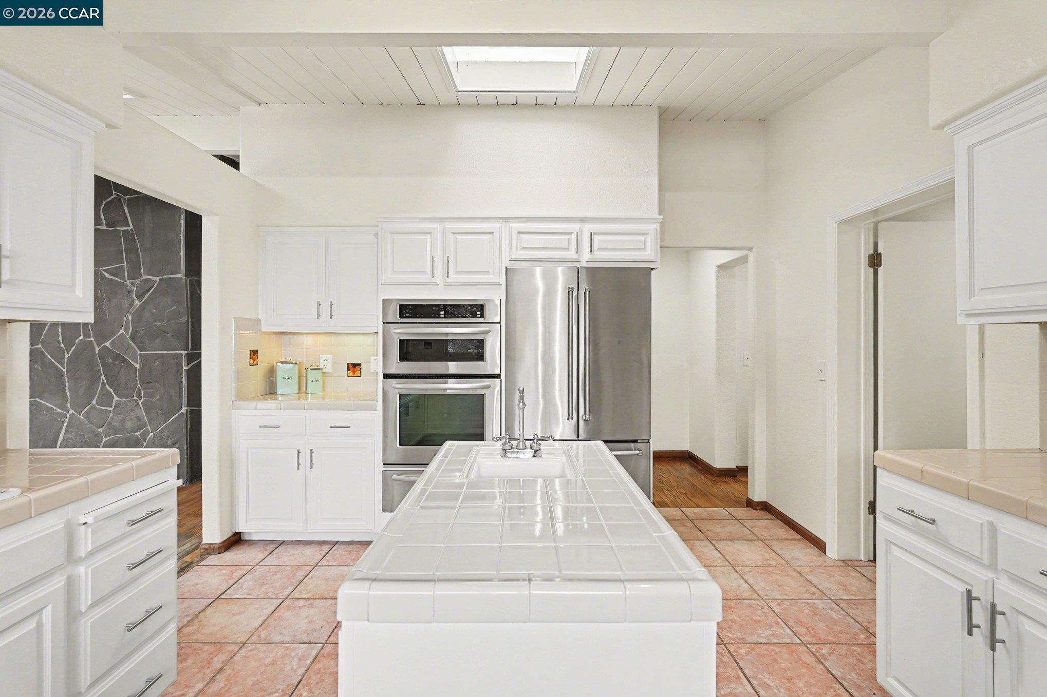 4885 Milden Road Martinez, CA 94553 - Photo 18 of 52 a kitchen with a refrigerator and cabinets
