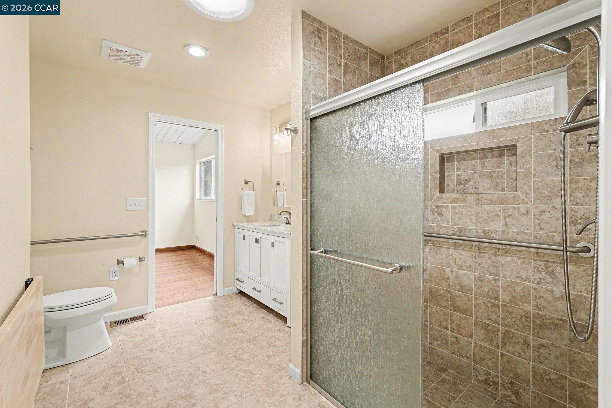 4885 Milden Road Martinez, CA 94553 - Photo 28 of 52 a bathroom with a shower and a toilet
